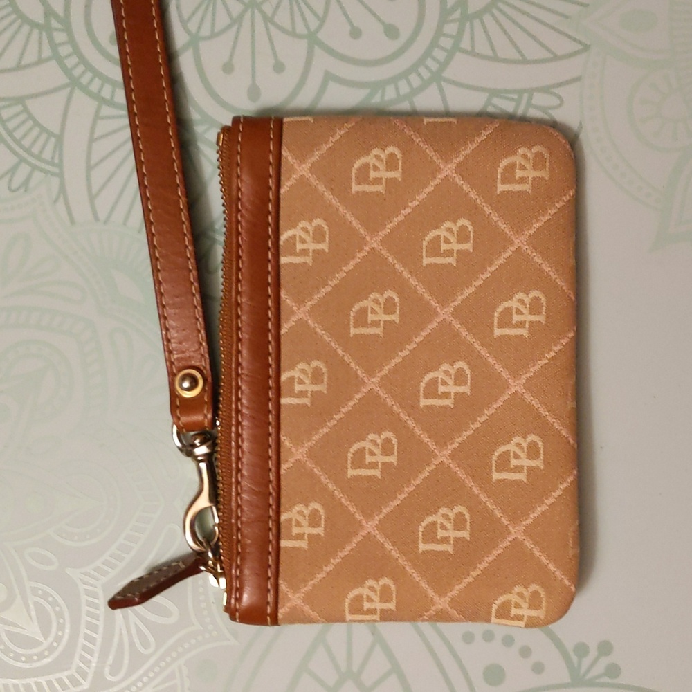 Dooney & Bourke wristlet in beige, brown and pink with leather detailing